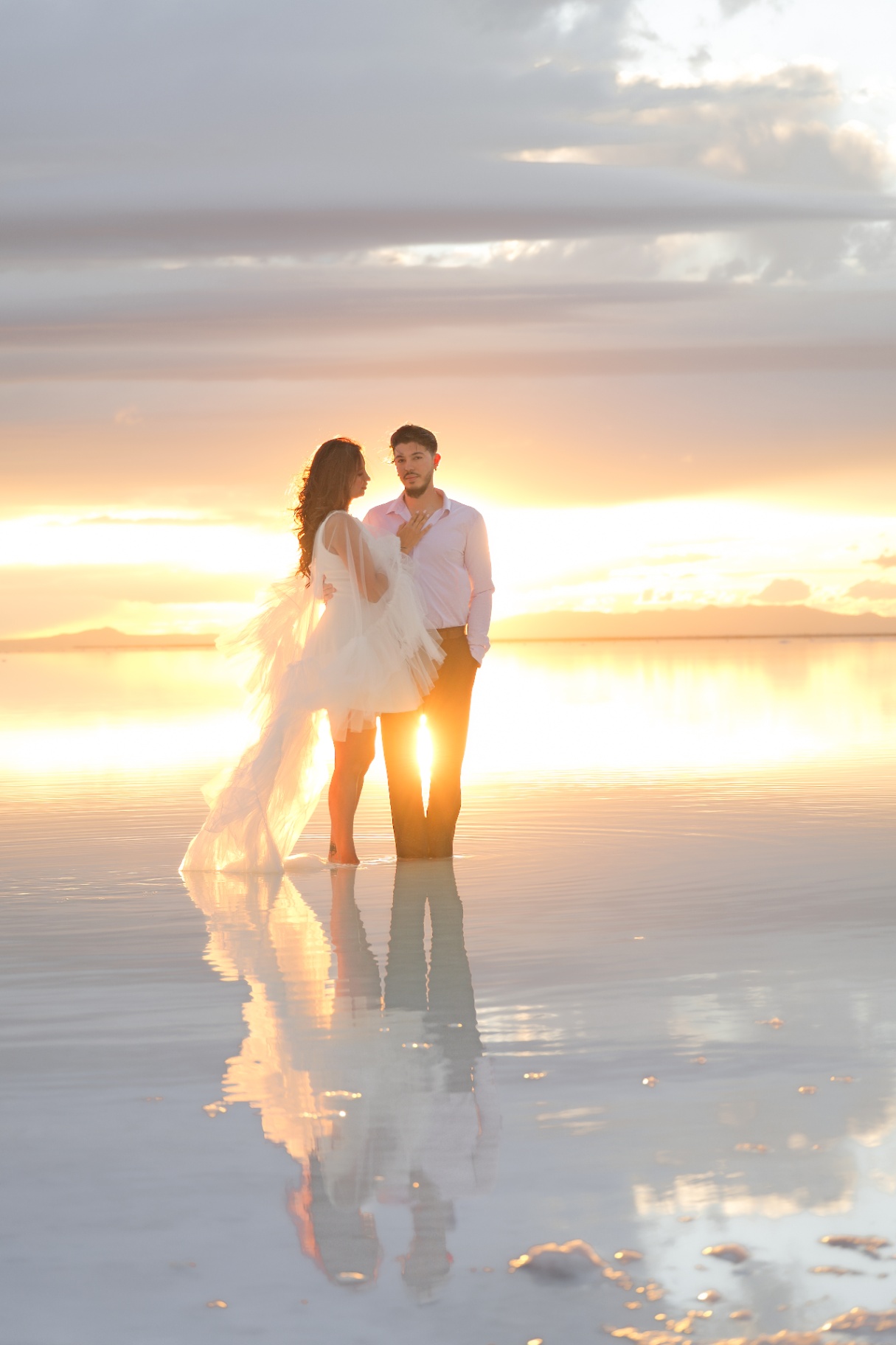 Couple at sunset on the salt flats