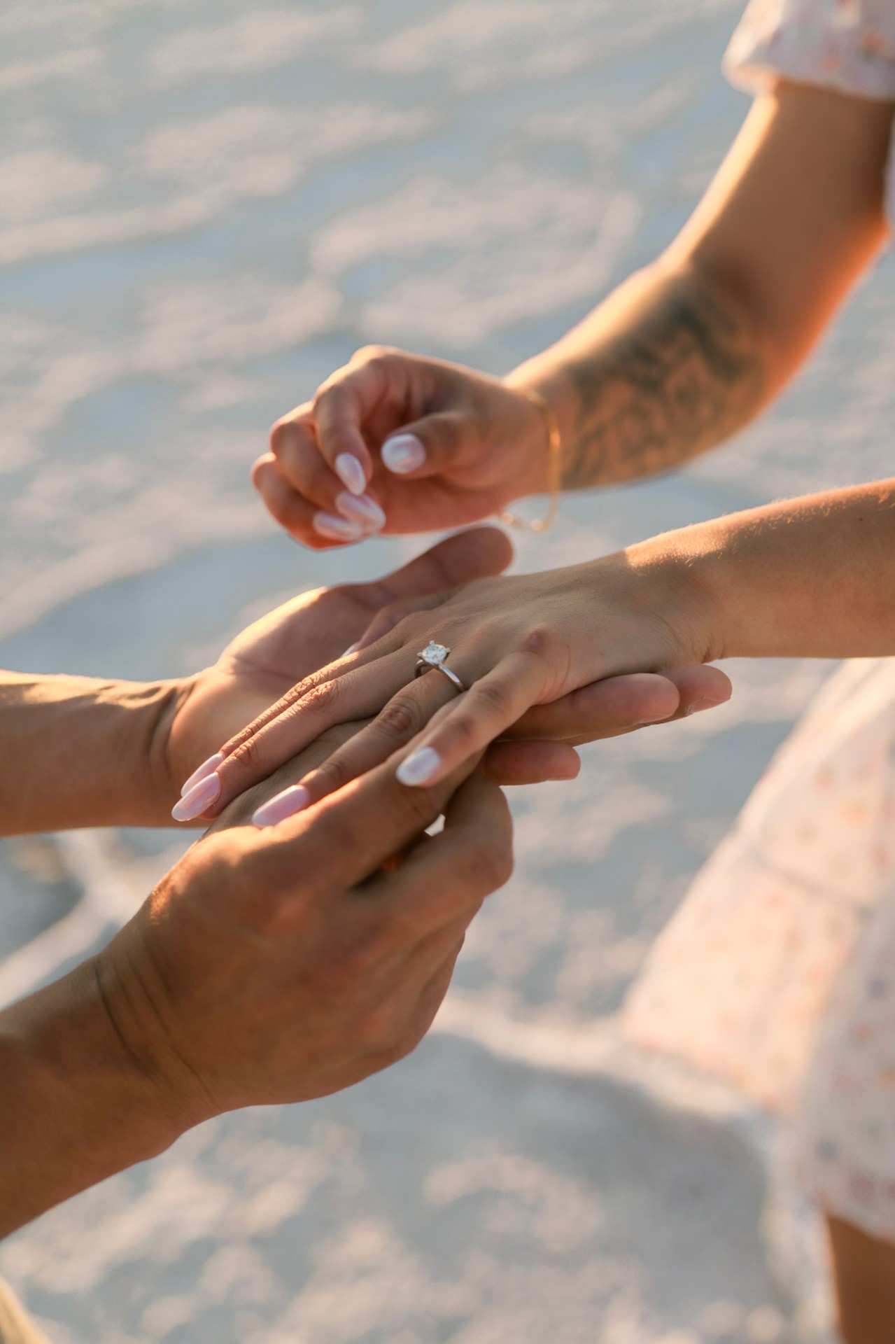 Close-up of hands after the proposal, ring on finger